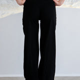 JET BLACK WIDE LEG PANTS.