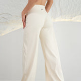IVORY WIDE LEG PANTS.
